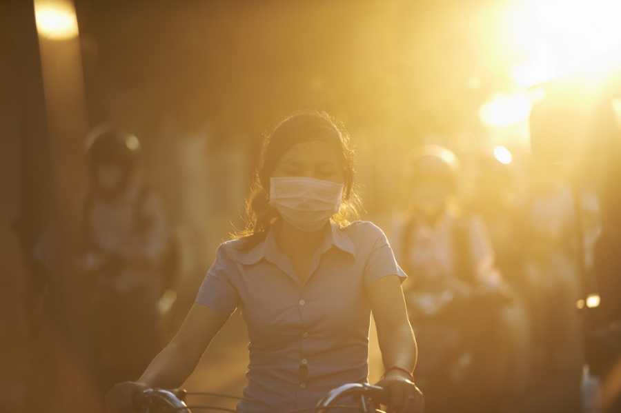 Woman wearing mask in Bangkok.