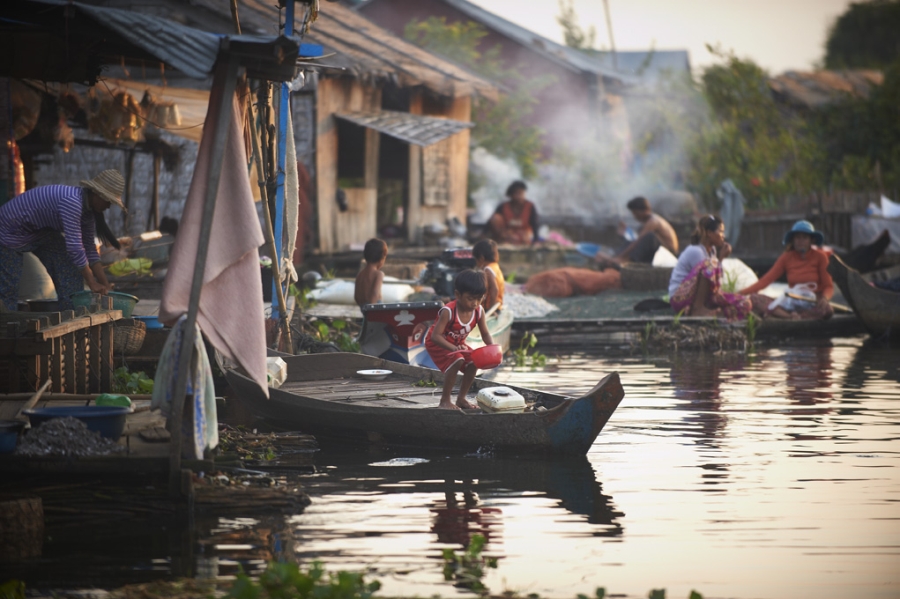 Busy view of floating village on Siem Reap river.