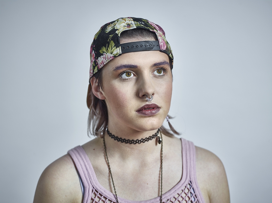 Headshot of young alternative woman. 