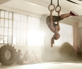 Woman exercising in gym.