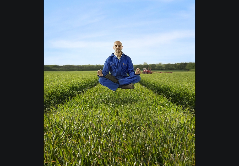 Male Farmer Meditating