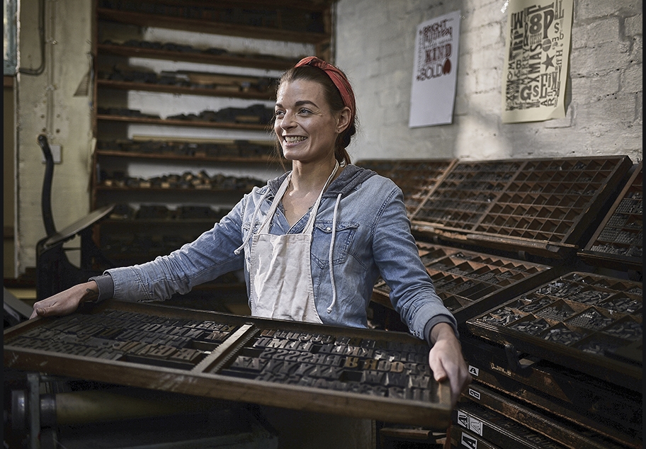 Female Working In Letter Press