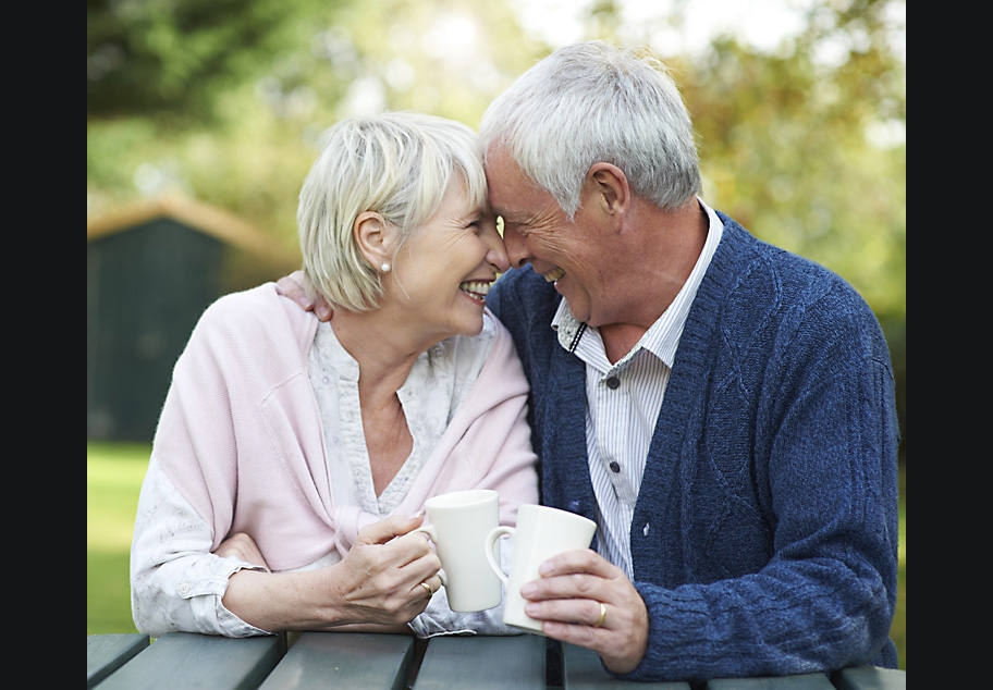 Retired couple embracing