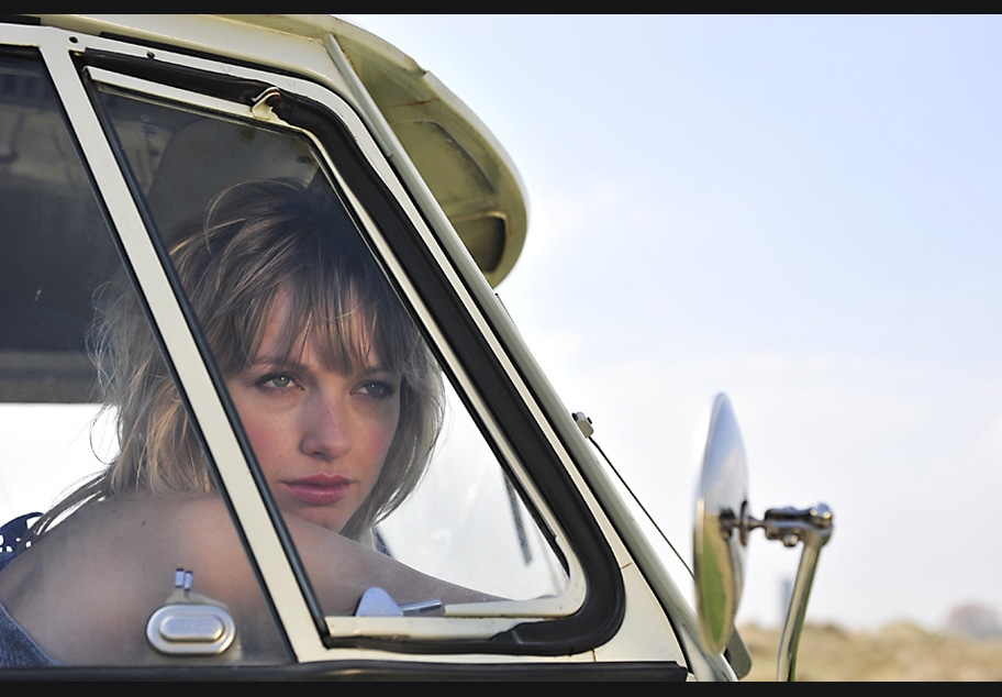 Female gazing out of camper van window